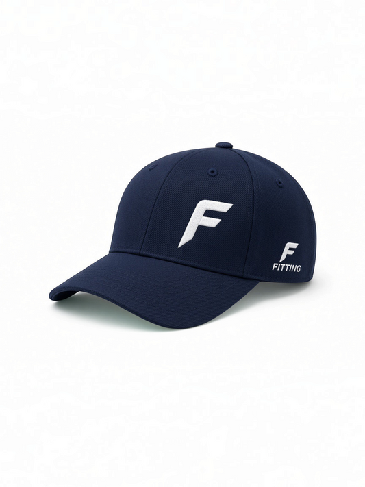 FITTING navy blue performance golf cap with white embroidered F logo on front and side branding