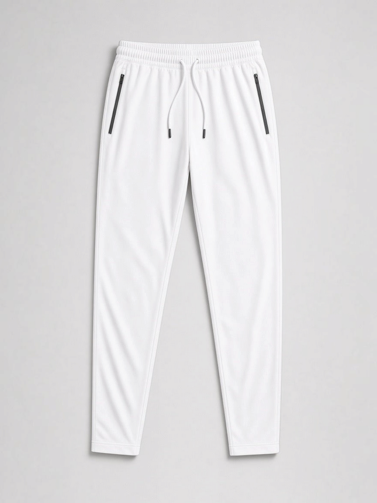 FITTING white Dri-Fit nylon spandex performance trousers with an elastic drawstring waist and zippered side pockets.