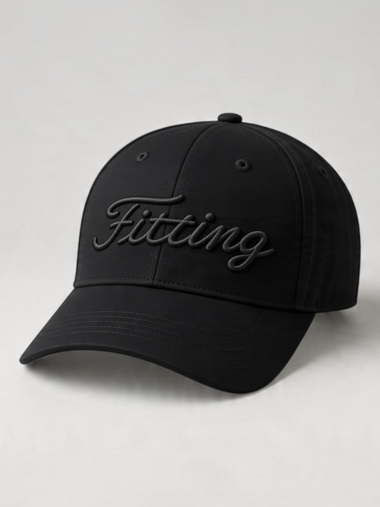 FITTING black baseball cap with tonal embroidered script logo, featuring a classic six-panel design.