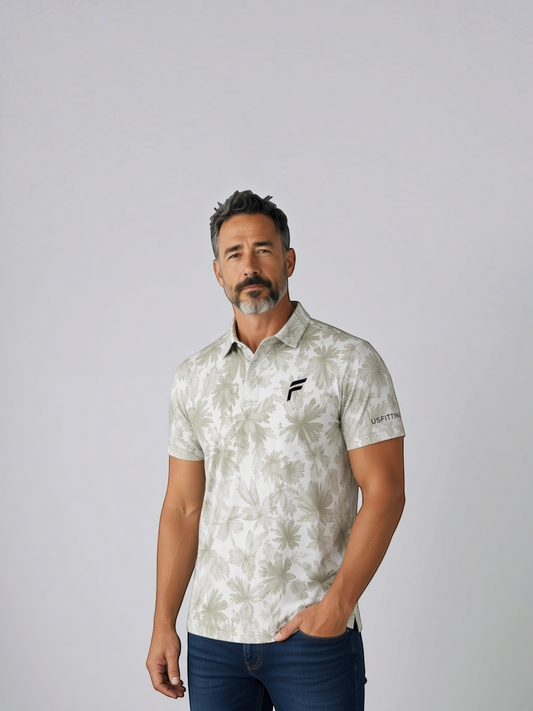 FITTING Executive Golf Polo in beige with a tropical palm leaf print, moisture-wicking fabric, and short sleeves.